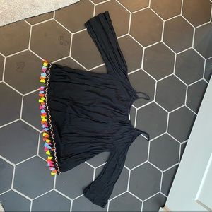 Cold shoulder with neon colored tassels shirt